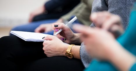 Zoom In On Hands Taking Notes