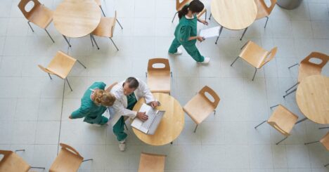 Physicians During Work Break In Cafeteria