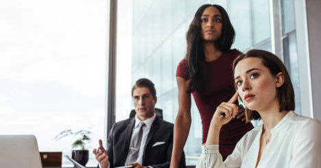 Woman With Colleagues During A Meeting In Office